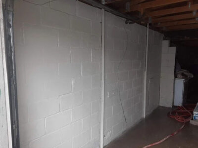 Cracked Garage Wall by Mudjack Concrete LLC