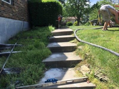 Fixing Slanted Stairs at Mudjack Concrete LLC
